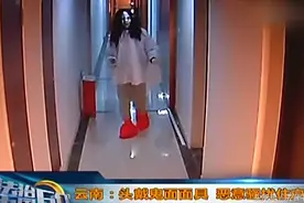 头戴鬼面面具 恶意骚扰住户图片