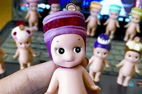 收藏“天使娃娃”的姑娘图片