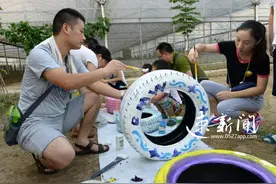 速新闻亲子家庭露营归来，轮胎涂鸦玩出新乐趣图片
