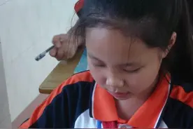 衣服不小心沾染了蓝墨水渍，用这个办法可以轻松洗掉图片