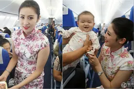 中秋节中国空姐穿旗袍迎客图片