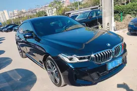 才开两年的宝马6系被人撞了，贬值损失20多万，让对方赔5万多吗？图片