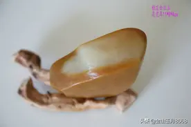 奇石欣赏之金丝玉糖皮手把件图片