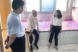 王文娟“八一”前夕慰问退役老军人和伤残退役军人图片