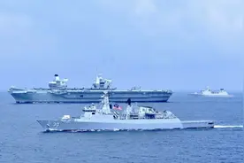 英国航母已进入菲律宾海，经过南海为何突然低调了？图片