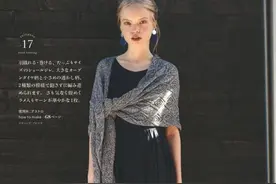 精美的镂空钩织时尚披肩，随意的斜斜的披在长裙外，活泼又端庄图片