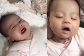 小婴儿“奶睡”后有多萌？表情变化生动，脸上仿佛写着“满足”图片