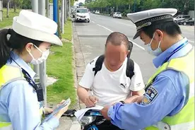 6月1日起，在上海骑电瓶车不戴安全头盔要处罚吗？交警现身回答！| 申晨间图片