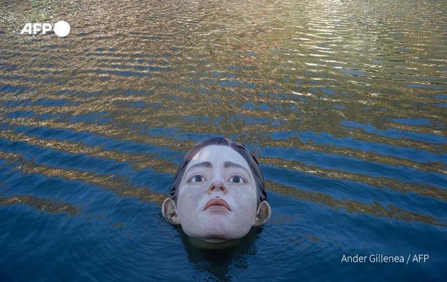 西班牙河里浮现少女人头雕像,又见"阴间设计"?吓哭大批网友