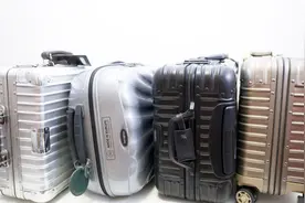 有三个Rimowa日默瓦行李箱，但是我却只用新秀丽视频封面