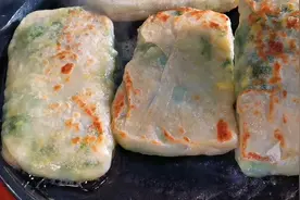 韭菜盒子最独特的快速做法，一抻一拉，皮薄大馅，2分钟出锅图片