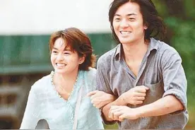 1999年梁咏琪郑伊健恋爱惹怒杨受成，几日后，“蛋糕门”传遍香港图片