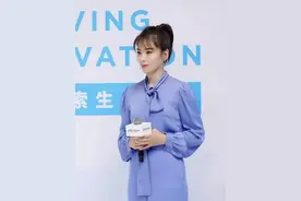 刘涛终于换新发型了，微卷短发再绑个小啾啾，41岁也能嫩回23岁图片