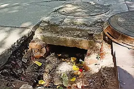 单元门口污水井“张嘴”不安全图片