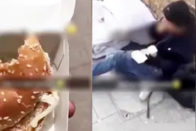 恶劣！小伙为博眼球拍摄视频 汉堡上吐口水给流浪汉吃视频封面