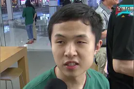 记者见闻：传授手机新“利器” 盲人轻松拍照片