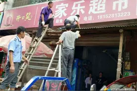 邵阳县谷洲镇限期拆除临街违章搭建棚架见成效图片