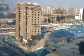 中科信息大厦爆破曾是河南科技市场标志性建筑 建筑渣土等已覆盖图片