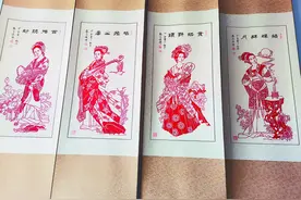 海伦市36岁小儿麻痹症患者王洪岩，靠精湛剪纸技艺营收图片
