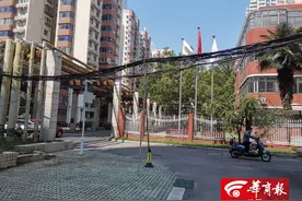 西安高新路枫叶高层改造完线缆“随意”搭 旁边就是幼儿园图片