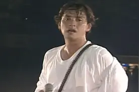 讲不出再见 谭咏麟图片