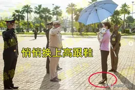 泰国王后弄巧成拙，穿高跟鞋抱狗走贵妇风，哪知小白狗忽然撒野图片