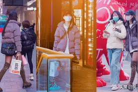 街拍：丝袜长靴秀美腿，漏光效果实拍羽绒服小姐姐更唯美图片