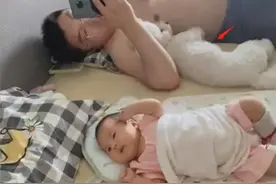 奶爸哄娃错把狗子搂在怀，父爱如“山体滑坡”，孩子是“意外”？图片