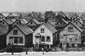 1858年的芝加哥，为建下水道，用千斤顶顶起整座城图片