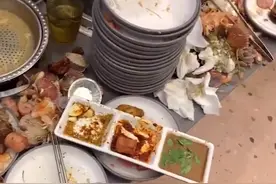 南昌男子吃自助餐，扬言给老板上一课，空盘堆成山，走不动还在吃图片