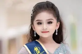 泰国6岁小女孩浓妆高跟鞋选美当选冠军，卸妆后，这还是她吗？图片