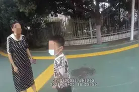 漯河一男童跑出家门玩耍，跟丢姐姐却遇上热心交警图片