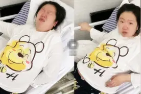产妇上一秒宫缩疼得表情扭曲，下一秒却画风突变：疼也不忘记吃图片