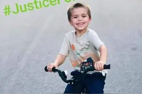 美国5岁男孩骑童车到邻居家，男主人走到跟前一枪将其爆头打死图片