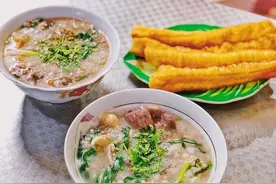 越南夜宵摊特色美食：牛肉粥，螃蟹脚，夹肉面包图片
