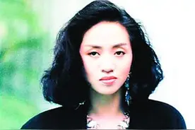 为了不让爱人看到自己病危的样子，梅艳芳死前拒绝他探视图片