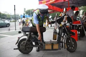 本月起，电动车执行“三禁交规”，其一：推车过斑马线图片