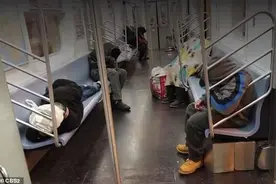 纽约地铁被流浪汉占领，不戴口罩直接在车上睡觉吃饭大小便图片