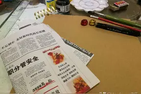 幼教之创意美术课程：废旧报纸撕贴画——喵呜图片
