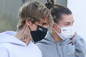 贾斯汀·比伯在脖子上纹了一朵玫瑰，粉丝却认为这是纪念前女友图片