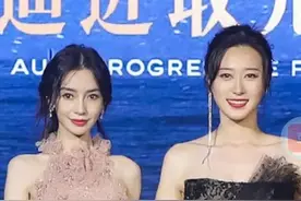 baby跟奥运冠军同框，气质身高被对方“碾压”，微笑唇太诡异图片