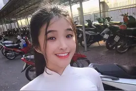 她被称为越南版“奶茶妹妹”身穿奥黛服饰 天使般面孔太惹眼图片