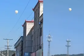 两个村民坐氢气球打松籽飞上天：越飘越高，降落后被警方带走视频封面