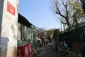 天坛老平房区拆违，还胡同原貌，居民:“门口敞亮，痛快”图片