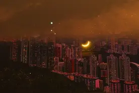 落日弥漫的橘·天边透亮的星图片