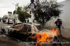 「2021 普利策奖」莱卡相机挡子弹 美国首位华裔摘冠图片