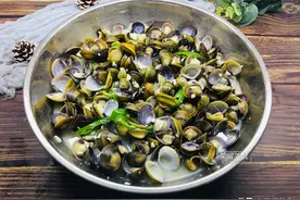 人称“西江鲍鱼”的它，肉质肥美，用来做一道会发出声音的美食图片