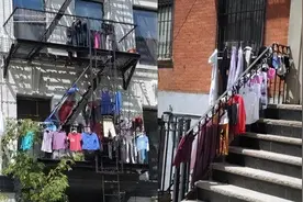 湖南发现一户高层晾衣服，装法实在令人钦佩，有才，拍给大家看看图片