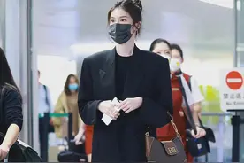 何穗真有超模素养，宽肩西装配长筒靴，这大长腿难怪让陈伟霆着迷图片