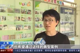 捡到巨款拾金不昧 上海一对姐弟将捡到的50万元悉数上交图片